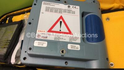 1 x Laerdal Heartstart FR2+ Defibrillator and 1 x Laerdal Heartstart FR2 Defibrillator with 2 x Philips M3863A Batteries *Install Dates 07-2024, 09-2025* In Carry Bags (Both Power Up and Pass Self Tests) *SN 1002073572, 0207226062* - 5