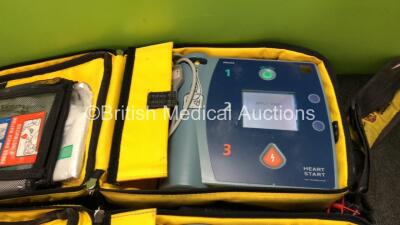 2 x Philips Heartstart FR2+ Defibrillators with 2 x Philips M3863A Batteries *Install Dates 05-2020, 08-2020* In 2 x Carry Bags (Both Power Up and Pass Self Tests) *SN 1110990929, 1011890751* - 2