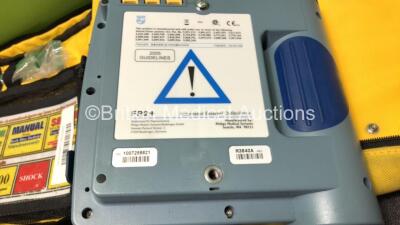 2 x Laerdal Heartstart FR2+ Defibrillators with 2 x Philips M3863A Batteries *Install Dates 11-2023, 07-2024* 2 x Defibrillator Electrodes *Both In Date* In 2 x Carry Bags (Both Power Up and Pass Self Tests) *SN 0510801551, 1007258821* - 4
