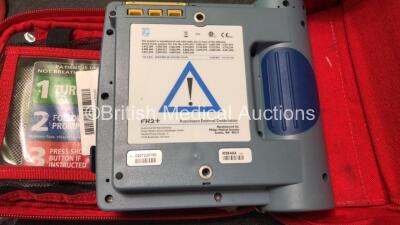 2 x Laerdal Heartstart FR2+ Defibrillators with 2 x Philips M3863A Batteries *Install Dates 09-2025, 12-2024* 2 x Defibrillator Electrodes *1 In Date, 1 Expired* In 2 x Carry Bags (Both Power Up and Pass Self Tests) *SN 0207225750, 0307227407* - 4