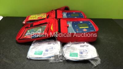 2 x Laerdal Heartstart FR2+ Defibrillators with 2 x Philips M3863A Batteries *Install Dates 09-2026, 02-2021* 2 x Defibrillator Electrodes *Both Out of Date* In 2 x Carry Bags (Both Power Up and Pass Self Tests) *SN 1207266842, 0207224837*