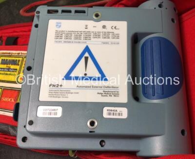 2 x Laerdal Heartstart FR2+ Defibrillators with 2 x Philips M3863A Batteries *Install Dates 09-2026, 02-2021* 2 x Defibrillator Electrodes *Both Out of Date* In 2 x Carry Bags (Both Power Up and Pass Self Tests) *SN 1207266842, 0207224837* - 5