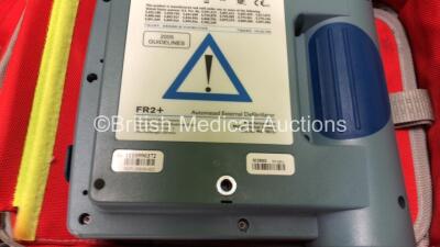 2 x Philips Heartstart FR2+ Defibrillators with 2 x Philips M3863A Batteries *Install Dates 05-2020, 01-2023 * 3 x Defibrillator Electrodes *All Out of Date* In 2 x Carry Bags (Both Power Up and Pass Self Tests) *SN 1110990372, 0905166713 - 4