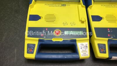 2 x Cardiac Science Powerheart AED G3 Automated External Defibrillators with 2 x Cardiac Science Ref 9146-302 Batteries in 1 x Carry Case (Both Power Up, 1 with Service Required Message) *SN 4403858, 4412680* - 2