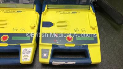 2 x Cardiac Science Powerheart AED G3 Automated External Defibrillators with 2 x Cardiac Science Ref 9146-302 Batteries in 1 x Carry Case (Both Power Up, 1 with Service Required Message) *SN 4403858, 4412680* - 3