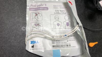 3 x Zoll AED PRO Defibrillators with 1 x 3 Lead ECG Leads, 1 x Defibrillator Pads *In Date* 3 x Batteries in 3 x Carry Bags (All Power Up) *SN AA08H011345, AA13C027857, AA09B013084 - 4