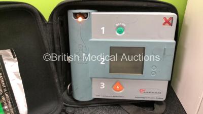 Job lot Including 1 x Medtronic Lifepak 500 Biphasic Automated External Defibrillator in Carry Bag (Untested Due to No Battery) 1 x Hewlett Packard Heartstream Semi Automatic Defibrillator (Powers Up) with 1 x Battery and 1 x Electrode Pack *Expired* in C - 6