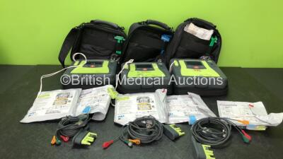 3 x Zoll AED PRO Defibrillators with 3 x Batteries with 3 x 3 Lead ECG Leads, 5 x Defibrillator Pads *All Out of Date* In 3 x Carry Bags (All Power Up) *SN AA10C016659, AA11B019852, AA07E005828*