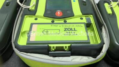 3 x Zoll AED PRO Defibrillators with 3 x Batteries with 1 x 3 Lead ECG Lead, 4 x Defibrillator Pads *All Out of Date* In 3 x Carry Bags (All Power Up) *SN AA14H033202, AA07EOO5946, AA13C027915* - 3