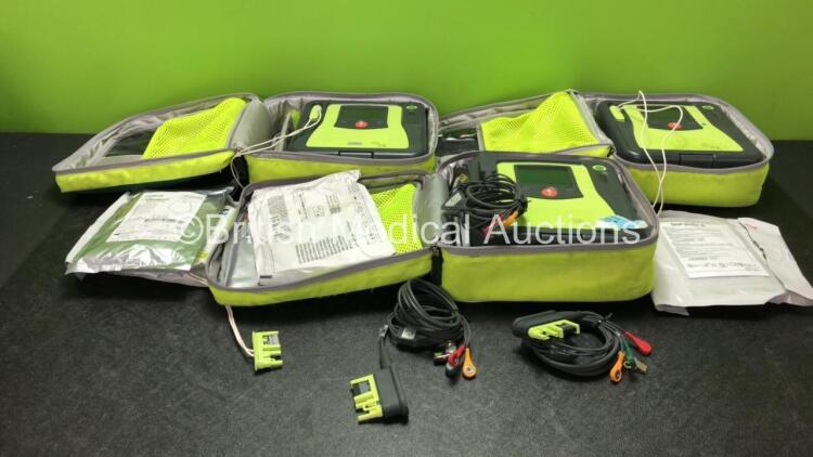 3 x Zoll AED PRO Defibrillators with 3 x Batteries with 3 x 3 Lead ECG Leads, 5 x Defibrillator Pads *1 In Date 4 Out of Date* In 3 x Carry Bags (All Power Up, 1 Battery Included is Flat) *SN AA09F013947, AA07E006013, AA09F013920*
