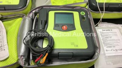 3 x Zoll AED PRO Defibrillators with 3 x Batteries with 3 x 3 Lead ECG Leads, 5 x Defibrillator Pads *1 In Date 4 Out of Date* In 3 x Carry Bags (All Power Up, 1 Battery Included is Flat) *SN AA09F013947, AA07E006013, AA09F013920* - 2