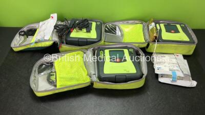 3 x Zoll AED PRO Defibrillators with 3 x Batteries with 2 x 3 Lead ECG Leads, 3 x Defibrillator Pads *All Out of Date* In 3 x Carry Bags (All Power Up) *SN AA10C016781, AA13C027734, AA11C020085*