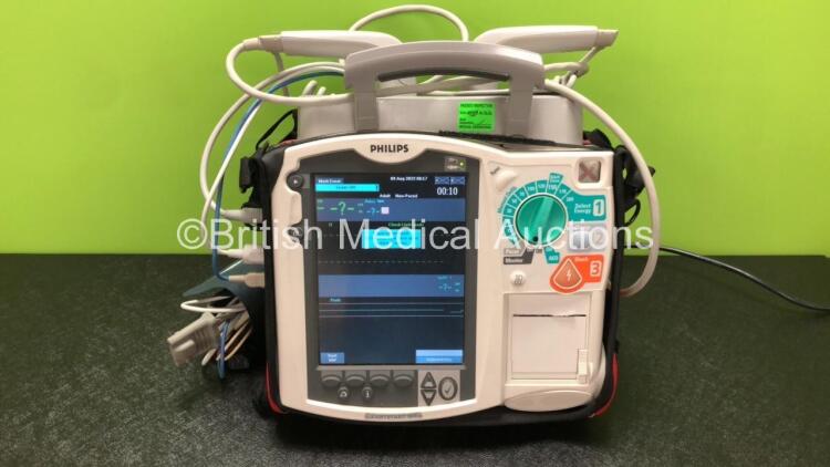 Philips Heartstart MRx Defibrillator Including Pacer, ECG, NiBP, SpO2 and Printer Options with External Hard Paddles, 1 x Paddle Lead, 1 x Power Module, 1 x 3 Lead ECG Lead, 1 x BP Cuff and 1 x SpO2 Finger Sensor (Powers Up)