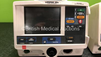 2 x Lifepak 20e Defibrillators Including ECG and Printer Options (1 x Draws Power Does Not Power Up, Both Missing Printer Modules, 1 x Spares and Repairs) - 3