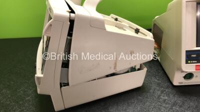 2 x Lifepak 20e Defibrillators Including ECG and Printer Options (1 x Draws Power Does Not Power Up, Both Missing Printer Modules, 1 x Spares and Repairs) - 4