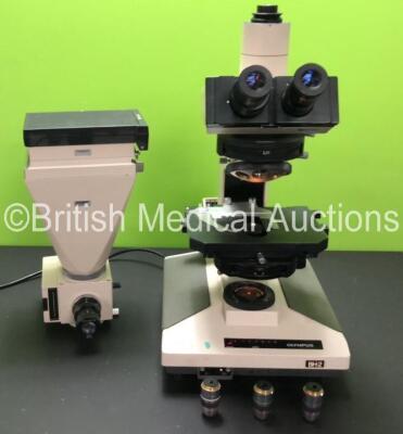 Olympus BH-2 Benchtop Microscope (Powers Up with Good Bulb) with 2 x Olympus WHK 10x/20 Eyepieces, 3 x Optics Including 1 x Olympus SPlan 100PL 1.25 Oil Optic, 1 x SPlan 40PL 0.70, 1 x SPlan 20PL 0.46 Optic and 1 x Olympus PM-10AD Photomicrographic System