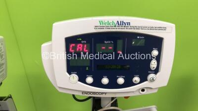 3 x Welch Allyn 53N00 Patient Monitors on Stands with 2 x Power Supplies and 1 x Welch Allyn Spot Vital Signs Monitor on Stand (All Power Up) - 3