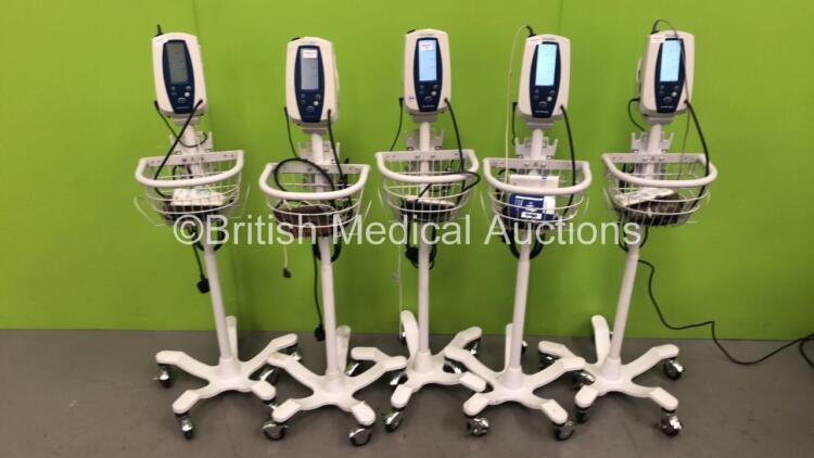 5 x Welch Allyn SPOT Vital Signs Monitors on Stands with Chargers and Some Leads (All Power Up)