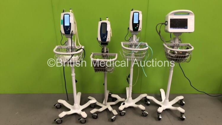 2 x Welch Allyn SPOT Vital Signs Monitors on Stands, 1 x Welch Allyn 420 Series Vital Signs Monitor on Stand and 2 x Welch Allyn 6000 Series Vital Signs Monitor on Stand (All Power Up) *S/N 103001281513*