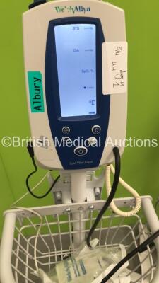 2 x Welch Allyn SPOT Vital Signs Monitors on Stands, 1 x Welch Allyn 420 Series Vital Signs Monitor on Stand and 2 x Welch Allyn 6000 Series Vital Signs Monitor on Stand (All Power Up) *S/N 103001281513* - 6