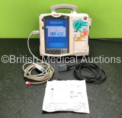 Philips MRx Defibrillator Including ECG and Printer Options with 1 x 3 Lead ECG Lead, 1 x Paddle Lead, 1 x Electrode Pack *In Date* and 1 x Philips M3538A Battery (Powers Up with Stock Battery Module, Battery Module Not Included, 1 x Battery Included)