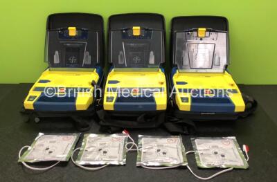 3 x Cardiac Science Powerheart AED G3 Automated External Defibrillators with 3 x Cardiac Science Ref 9146-302 Batteries and 4 x Electrode Packs *All Expired* in Carry Cases (All Power Up)