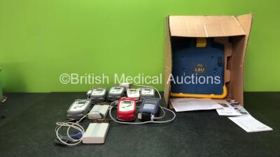 Mixed Lot Including 1 x LSU Wall Bracket *Unused in Box* 6 x Masimo Set Rad 5 Handheld Pulse Oximeters (2 Power Up, 3 No Power) 1 x Nellcor Oximax N-65 Handheld Pulse Oximeter (Untested Due to Possible Flat Batteries) 2 x Nonin Model 8500 Pulse Oximeters