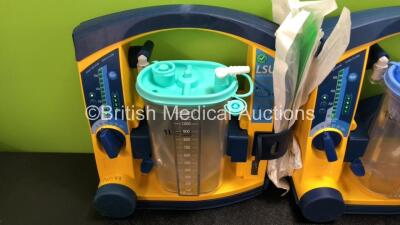 4 x Laerdal LSU Suction Units with 4 x Cups and 4 x Batteries (All Power Up, 1 x Missing Rubber Cap - See Photos) *SN 78271469697 / 78051969658 / 78271469761 / 78151467031* - 2