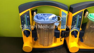 4 x Laerdal LSU Suction Units with 4 x Cups and 4 x Batteries (All Power Up, 3 x Missing Rubber Caps - See Photos) *SN 78122081687 / 78252087361 / 78081354297 / 78271469733* - 2