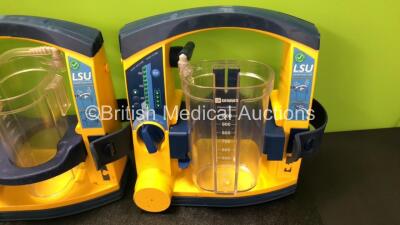 4 x Laerdal LSU Suction Units with 4 x Cups and 2 x Batteries (All Power Up, 2 x Missing Rubber Caps, 3 x Missing Cup Lids - See Photos) *SN 78301298079 / 78311298287 / 78101354914 / 78021069231* - 5