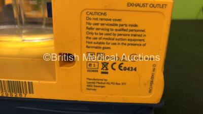 4 x Laerdal LSU Suction Units with 4 x Cups and 2 x Batteries (All Power Up, 2 x Missing Rubber Caps, 3 x Missing Cup Lids - See Photos) *SN 78301298079 / 78311298287 / 78101354914 / 78021069231* - 6