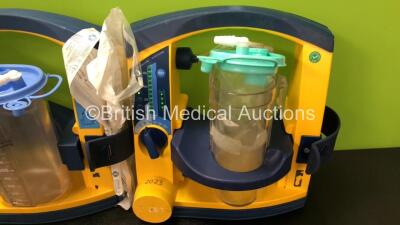 4 x Laerdal LSU Suction Units with 4 x Cups and 4 x Batteries (All Power Up, 3 x Missing Rubber Caps, 1 x Missing Cup Lid - See Photos) *SN 78071858797 / 78501758162 / 78232086127 / 78081354300* - 5