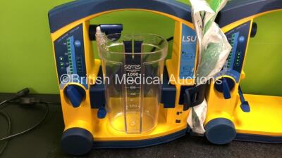 4 x Laerdal LSU Suction Units with 3 x Cups and 3 x Batteries (All Power Up, 2 x Missing Cup Lids - See Photos) *SN 78232086570 / 78271469724 / 78271469723 / 78262087961* - 2