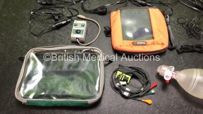 Mixed Lot Including 9 x LSU Vehicle DC Power Supplies, 1 x SpO2 FingerSim Module, 1 x Zoll 3 Lead ECG Lead, 1 x Ambu Resuscitator Balloon and Hose, 2 x AC/DC Adapters and 2 x Bags - 3