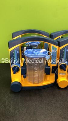 6 x Laerdal LSU Suction Units with 6 x Cups and 6 x Batteries (All Power Up, 1 with Missing Rubber Cap-See Photo) *SN 78481474879, 78081465014, 78080893387, 78081465035, 78051687133, 78251580617* - 2