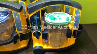 6 x Laerdal LSU Suction Units with 6 x Cups and 6 x Batteries (All Power Up, 2 x Missing Rubber Caps - See Photos) *SN 78230897985 / 78330787851 / 78081465029 / 78470854560 / 78481474880 / 78151184179* - 4