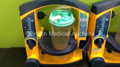 6 x Laerdal LSU Suction Units with 6 x Cups and 6 x Batteries (All Power Up, 2 x Missing Rubber Caps - See Photos) *SN 78070780300 / 78091687945 / 78481474877 / 78061294002 / 78080957241 / 78191184998* - 2