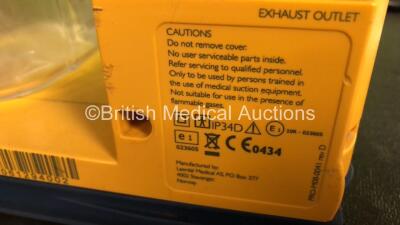 6 x Laerdal LSU Suction Units with 6 x Cups and 6 x Batteries (All Power Up, 2 x Missing Rubber Caps - See Photos) *SN 78070780300 / 78091687945 / 78481474877 / 78061294002 / 78080957241 / 78191184998* - 6