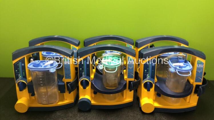 6 x Laerdal LSU Suction Units with 6 x Cups and 6 x Batteries (All Power Up, 2 x Missing Rubber Caps, 1 x Crack in Casing - See Photos) *SN 78091687939 / 78151184181 / 78230897960 / 78041686976 / 78310962645 / 78081465025*