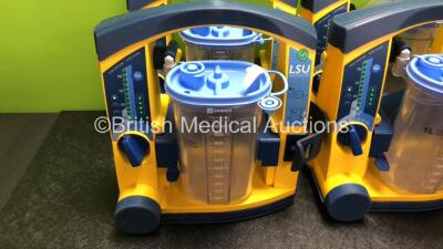 6 x Laerdal LSU Suction Units with 6 x Cups and 6 x Batteries (All Power Up, 1 x Missing Rubber Cap - See Photos) *SN 78081465016 / 78481474876 / 78041686993 / 78231074201 / 78231074213 / 78470854562* - 2