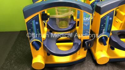 6 x Laerdal LSU Suction Units with 3 x Cups and 6 x Batteries (All Power Up, 3 x Cups Missing Lids, 3 x Missing Rubber Caps - See Photos) *SN 78191185013 / 78081687821 / 78471474590 / 78061294009 / 78041686975 / 78471474587* - 2