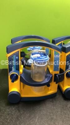 6 x Laerdal LSU Suction Units with 6 x Cups and 6 x Batteries (All Power Up, 1 x Missing Rubber Cap - See Photos) *SN 78091687931, 78081687761, 78041686977, 78311188108, 78151184178, 78021293396* - 2