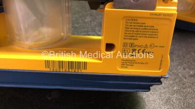 6 x Laerdal LSU Suction Units with 6 x Cups and 6 x Batteries (All Power Up, 1 x Missing Rubber Cap - See Photos) *SN 78091687931, 78081687761, 78041686977, 78311188108, 78151184178, 78021293396* - 4