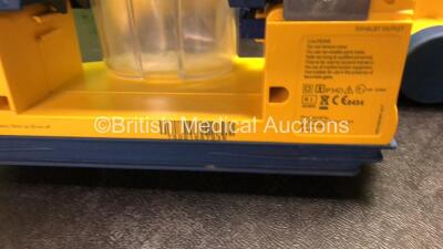 6 x Laerdal LSU Suction Units with 6 x Cups and 6 x Batteries (All Power Up, 3 with Missing Caps) *SN 78091687938, 78231074212, 78191184993, 78081465021, 78041686985, 78041686979* - 3