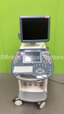 GE Voluson E8 Expert Flat Screen Ultrasound Scanner with Mitsubishi P95 Printer (Powers Up - Hard Drive Removed - Missing Dial,Crack to Keyboard and Scratches to Keyboard-See Photos) * SN D15424 * * Mfd Nov 2011 *