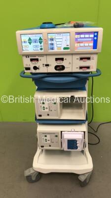 Covidien ForceTriad Electrosurgical /Diathermy Unit Software Version 3.60 *Mfd 2015-04* on Stand with Footswitch and 2 x RapidVac Smoke Evacuators (Powers Up) *SN T5D45811EX*