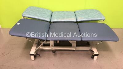 2 x Plinth Hydraulic Patient Examination Couches (Hydraulics Tested Working, 1 x Damaged Rail and 1 x Damaged Wheel- See Photo) *503HSP43122472A*