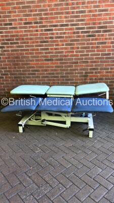 1 x Plinth 2000 Hydraulic Patient Examination Couch and 1 x Huntleigh Akron Hydraulic Patient Examination Couch (Hydraulics Tested Working - Rips to Cushions-See Photos)