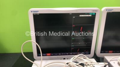 2 x Fukuda Denshi DS-7300 Patient Monitors with 2 x Fukuda Denshi US-700 Modules, 2 x NIBP Hoses, 2 x ECG Connection Leads and 2 x SpO2 Finger Sensors (Both Power Up) - 2