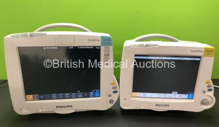 Job Lot Including 1 x Philips IntelliVue MP50 Anesthesia Patient Monitor *Mfd 2010* (Powers Up, Missing Dial, Slight Damage to Screen and Damaged Casing - See Photos) and 1 x Philips IntelliVue MP30 Patient Monitor *Mfd 2009* (Powers Up, Slight Damage to